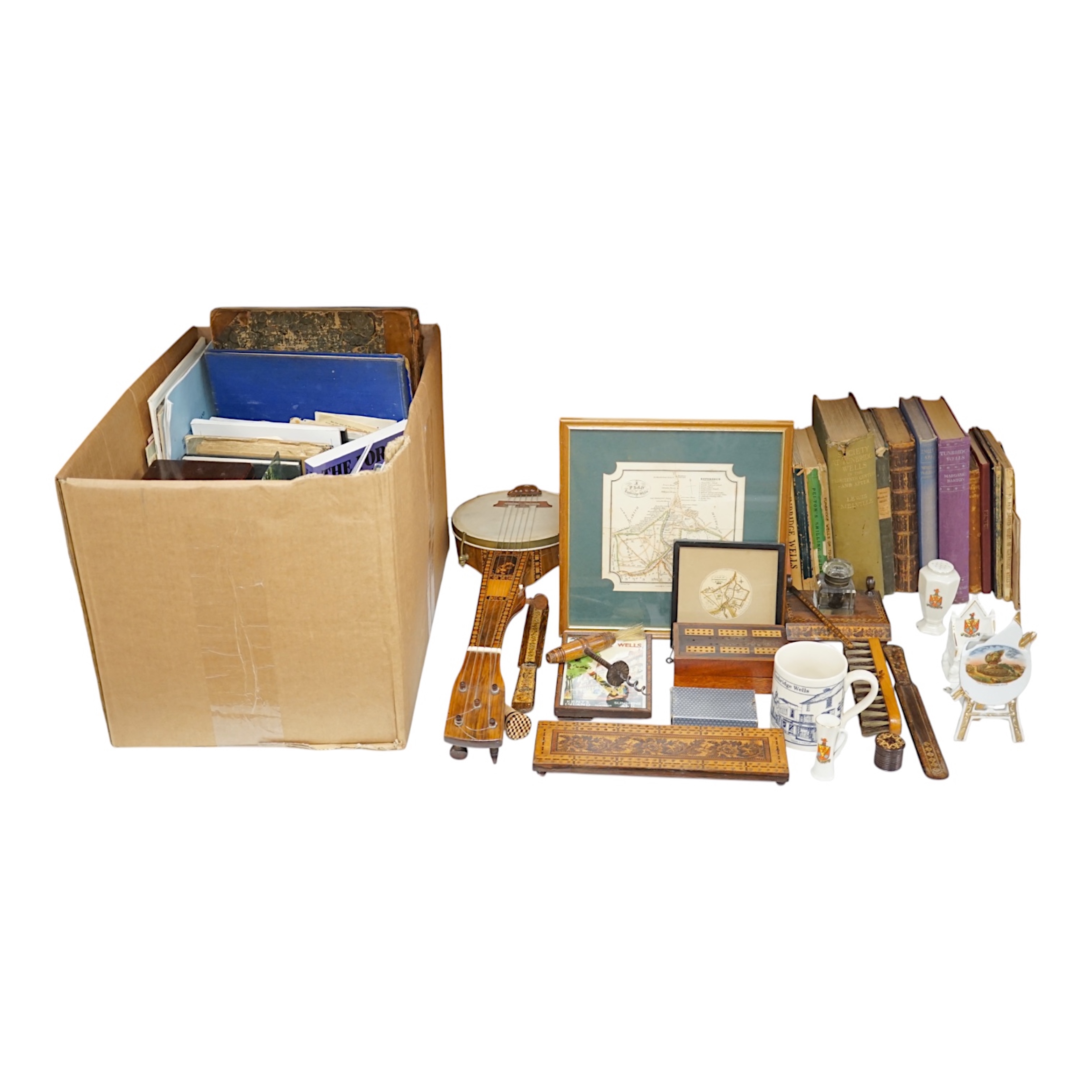 A collection of Tunbridgeware and related ephemera to include books, maps, cribbage board, desk stand and booklets. Condition - varies, mostly fair